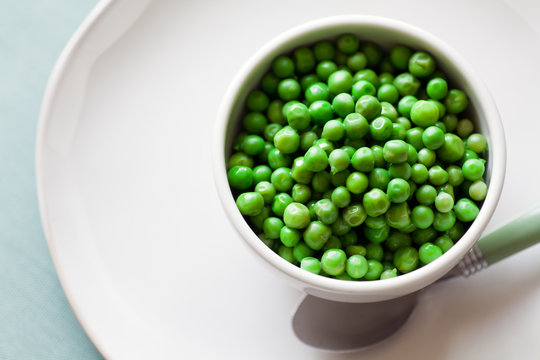 Lightly cooked Green Peas in a bowl. 