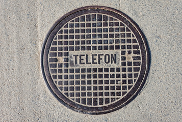 Telephone manhole cover
