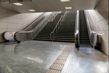Metro station escalators