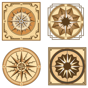 Vintage brown compasses and compass roses
