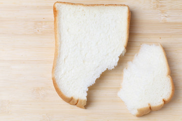 Slice of white bread isolated on white background.