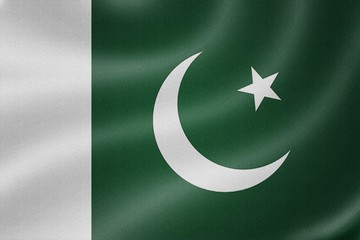 Pakistan flag on the fabric texture background