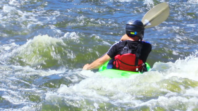 
Kayaker  on river have a fan. Rafting team
