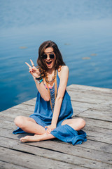 hippie girl on the dock
