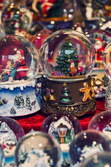 Beautiful Christmas snow globes at the Christmas market in the city, Germany
