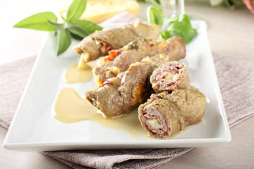 Meat rolls stuffed with bacon and cheese - 85296518