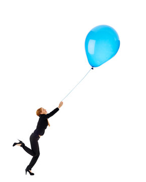 Businesswoman with balloon