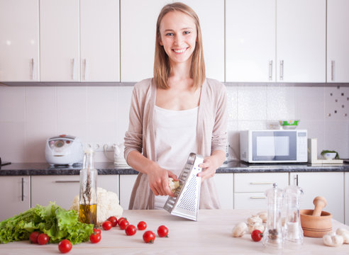  woman making healthy food in kitchen