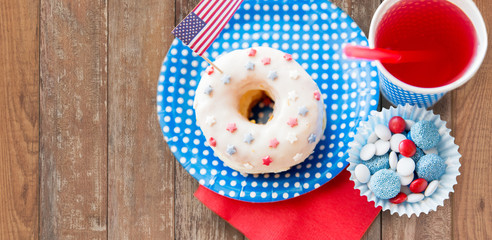donut with juice and candies on independence day