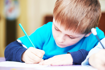 child boy studying writing