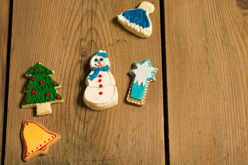 Christmas cookies on picnic table/Sweet cookies on wooden table