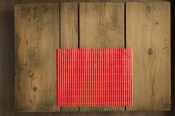 Cookbook background/ Red mat on wooden picnic table
