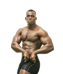 Fototapeta na wymiar Attractive hunky black male bodybuilder posing