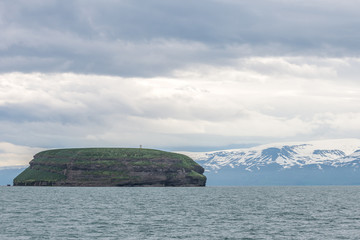 Lundey Island populated by puffins, Husavik, Iceland.
