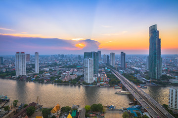 Fototapeta na wymiar Landscape of river in Bangkok cityscape with sunset