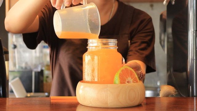 Mix Fresh Honeysuckle Orange Juice For Serving, Stock Video