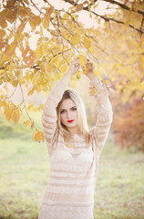 beautiful women in autumn park