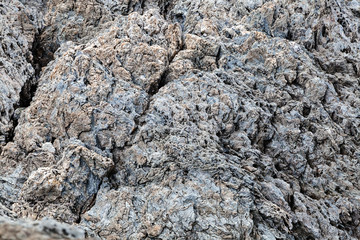 Sharp gray rocks on the beach