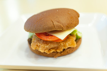 Unhealthy fried chicken cheese burger