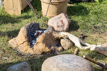 ancient clay forge, furs, hammer and other tools