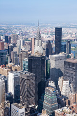 Fototapeta na wymiar New York, panoramic view of Midtown Manhattan as seen from the Empire State Building observation deck, in the center of the framing the Chrysler Building