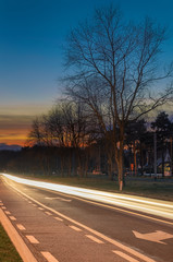 Fototapeta premium Cars light trails at sunset