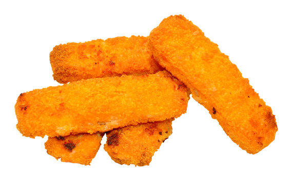 Cooked breadcrumb coated fish fingers isolated on a white background