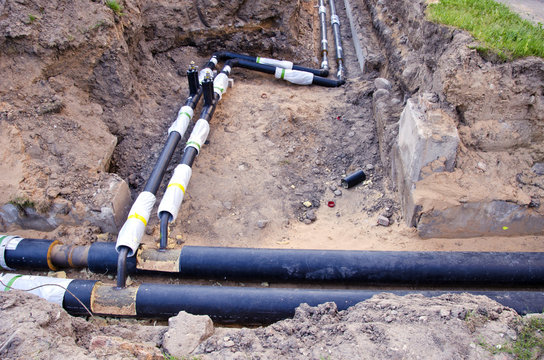  plastic modern technology black heating pipes in trench near house