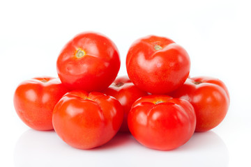 fresh tomatoes isolated on white background