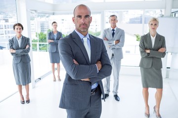 Fototapeta premium Businessman colleagues arm crossed