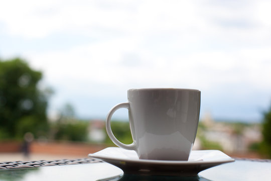 Cup of coffee on the balcony. Relax concept