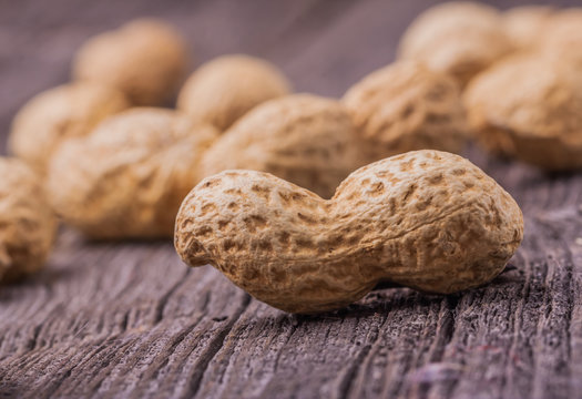 Peanuts on wooden table