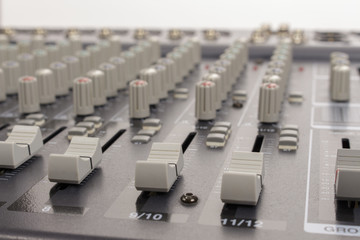 Obraz premium Close-up of audio mixing board sliders