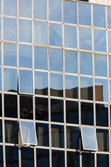 glass facade with opened windows