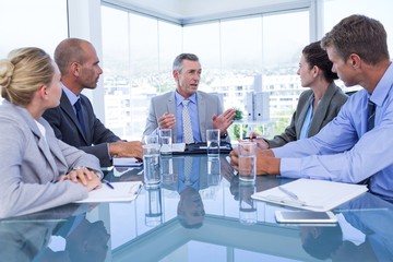 Business colleagues discussing about work