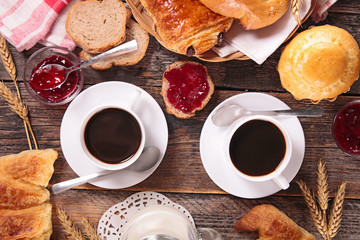 breakfast with coffee cup and pastries