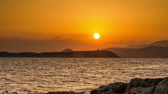 View Yellow Sunset from a shore time lapse