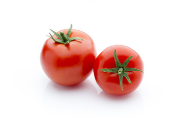 Tomato on the white isolatd background.