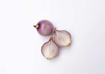 Red onion on white background