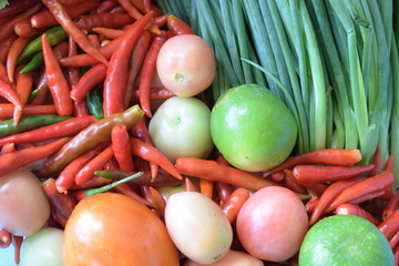 Assortment of vegetables, onion, parsley, red chilli, tomato and lemon