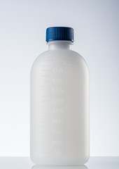 White plastic medicine bottle