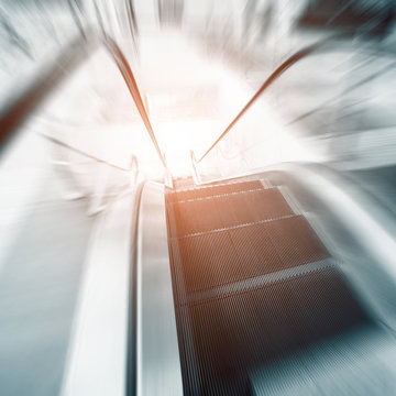 escalator in motion moving fast