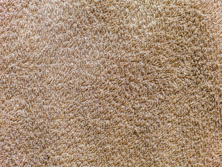The closeup of brown towel background.