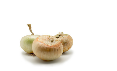 Three Onion vegetable bulbs isolated on white background