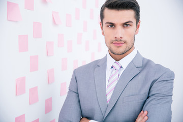 Handsome businessman standing in office