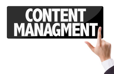 Businessman pressing button with the text: Content Management