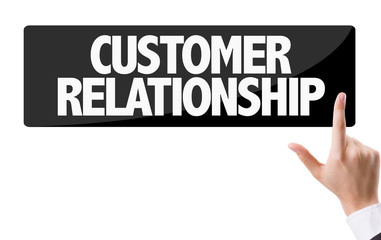 Businessman pressing button with the text: Customer Relationship