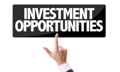 Businessman pressing button: Investment Opportunities