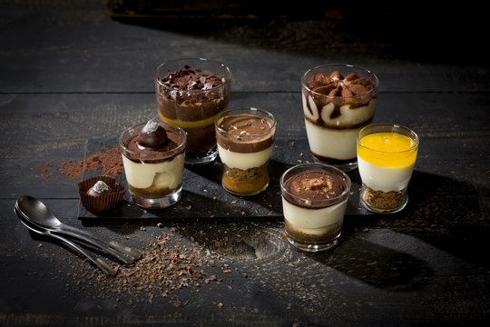 Glasses with different sorts of desserts