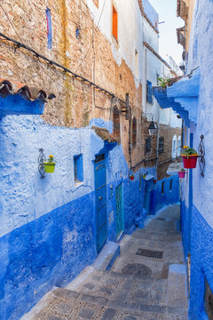Narrow alley in the picturesque town Chefchaouen, Morocco.